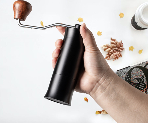 陶磁器のぎざぎざが付いている商業Expresso手動手のコーヒー豆挽器